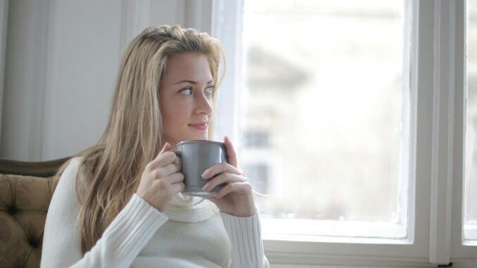 Woman having coffee break