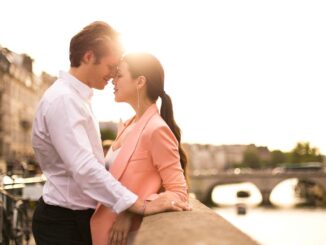 Couple on city riverside