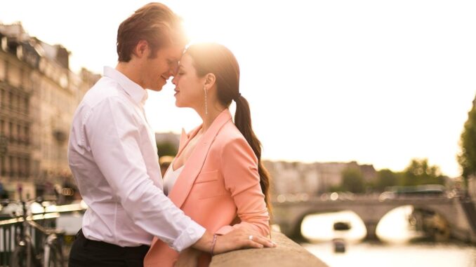 Couple on city riverside