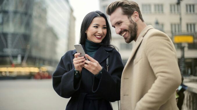 Couple looking at phone