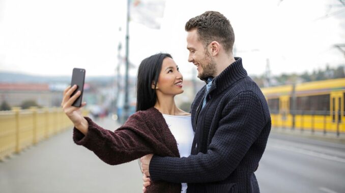 Couple taking selfie