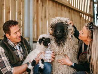 Tim and Tanya Spittle with bottle of BLACKLION Vodka