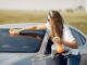 Woman cleaning car