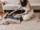 Girl packing clothes and gear
