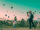 Couple watching balloons