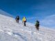 Mountaineers climbing in snow